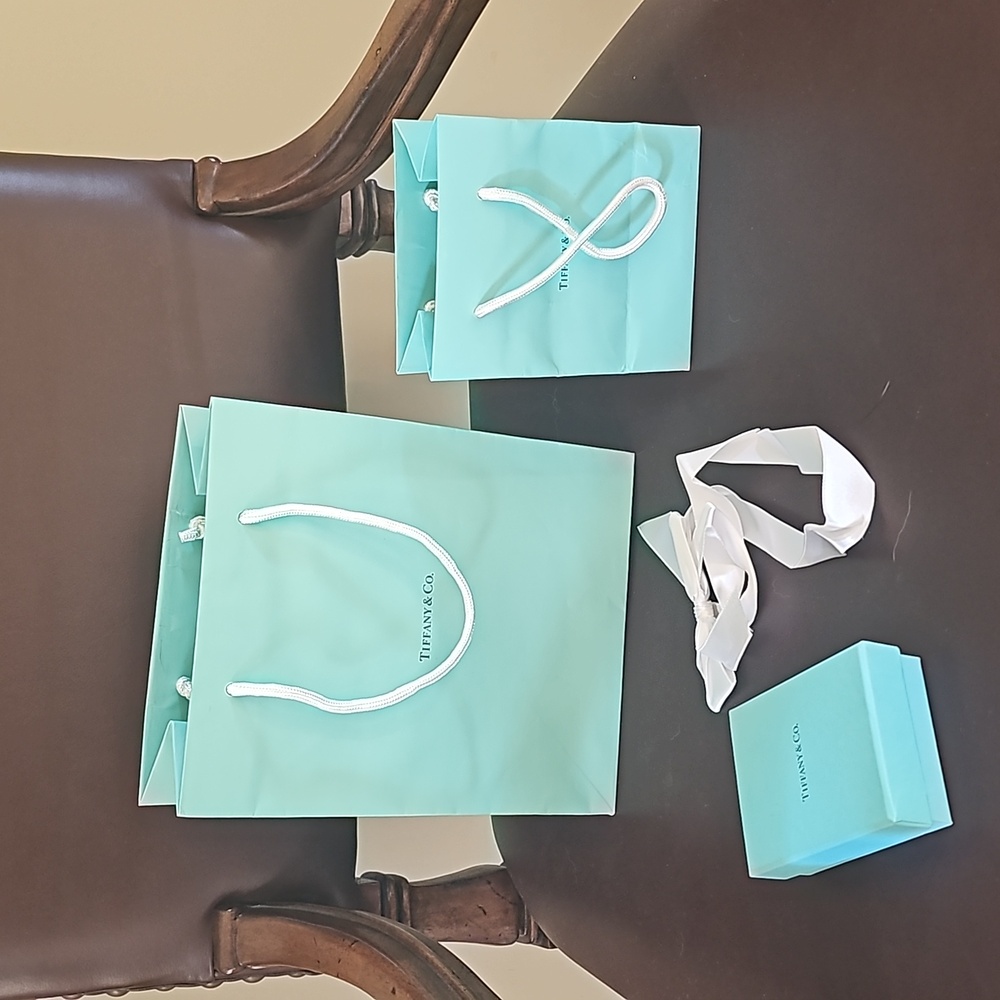 Tiffany & Co Shopping bags, ribbon and jewelry box.